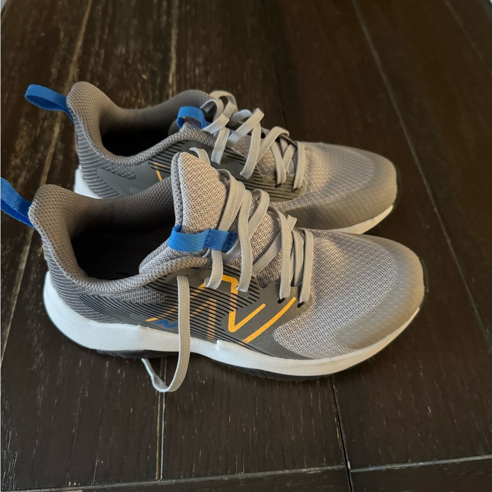 New Balance Gray Sneakers with Breathable Mesh and Unique Lacing